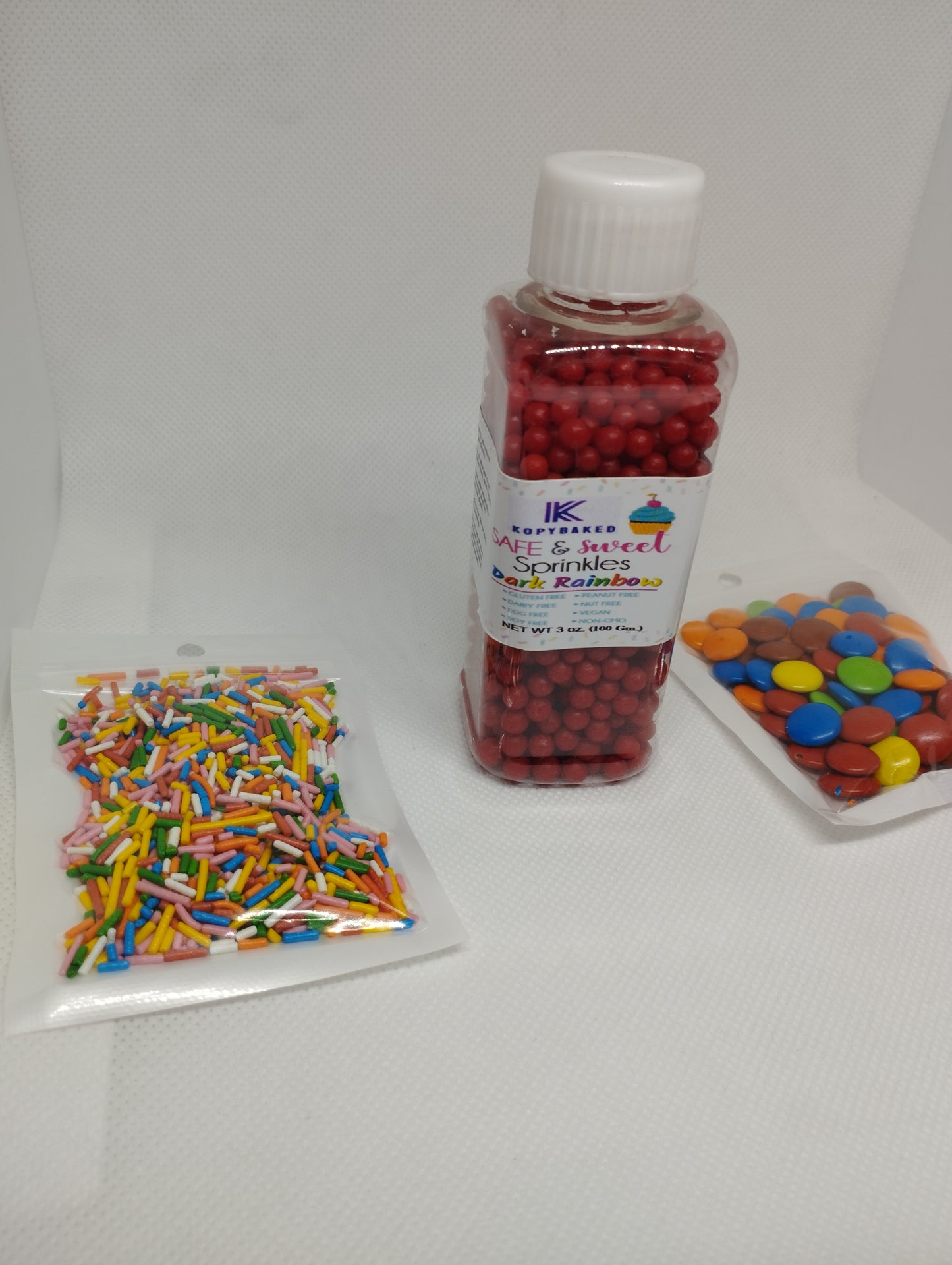 100 gm. Red sugar sprinkles Balls bottle use for topping on cake, Donuts, Cupcake, Pastries, Milk-Shake, and Ice-cream also on many things