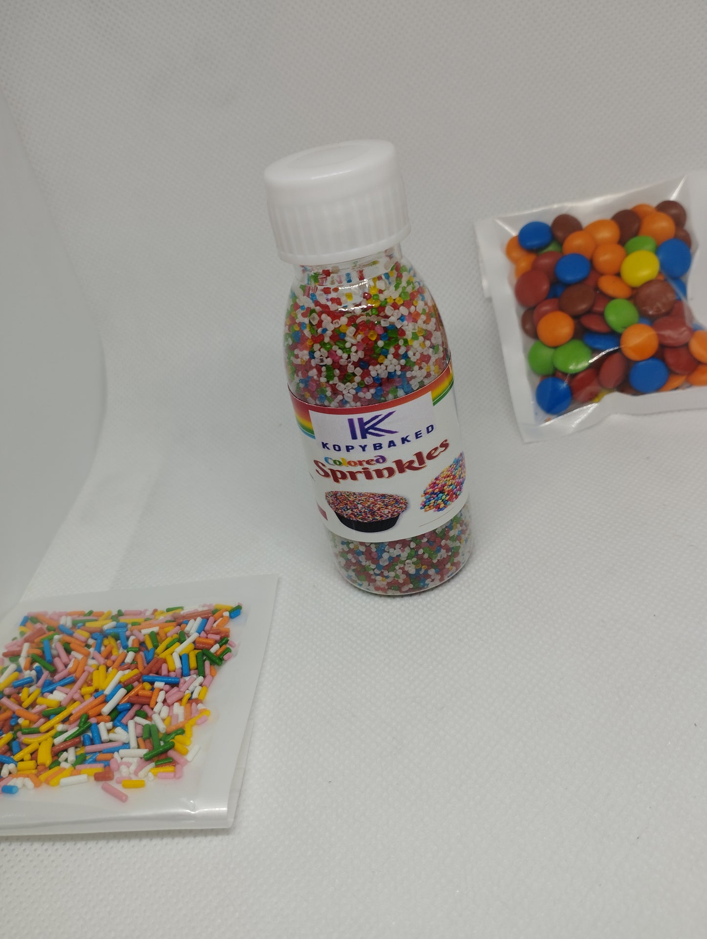 Rainbow Sugar Mini Balls 50 gm. Bottle use for Cakes decoration , pastries, Donuts, cupcake, ice-cream , milk shake, cakes etc